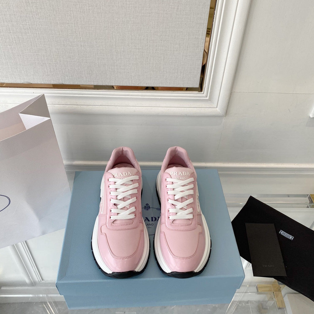 PRADA 25S THICK SOLE SNEAKER IN LIGHT PINK CALFSKIN AND CANVAS