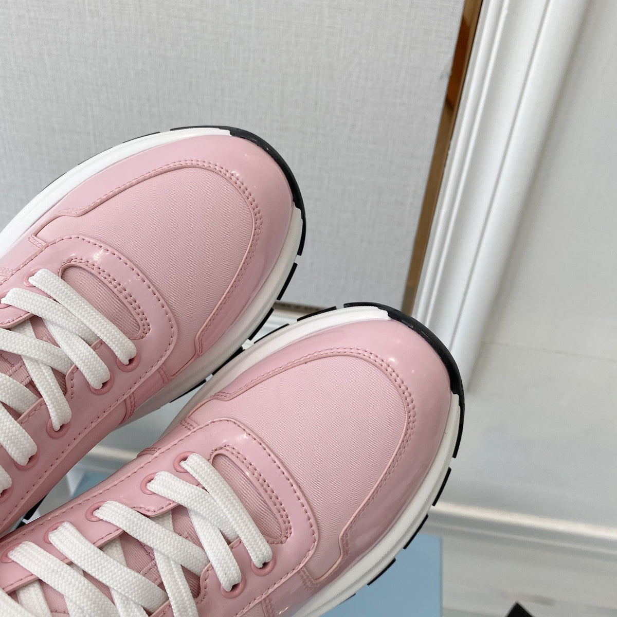 PRADA 25S THICK SOLE SNEAKER IN LIGHT PINK CALFSKIN AND CANVAS