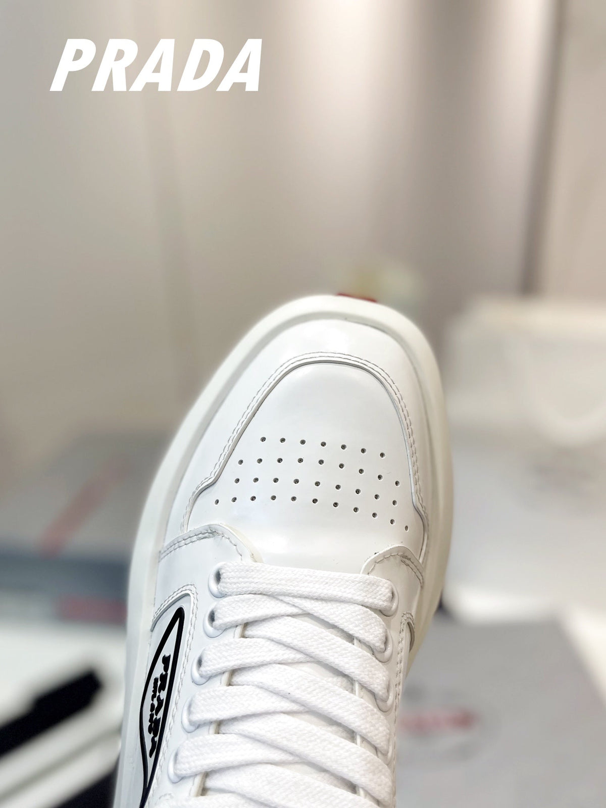 PRADA DOWNTOWN THICK-SOLE SNEAKERS WHITE CALFSKIN