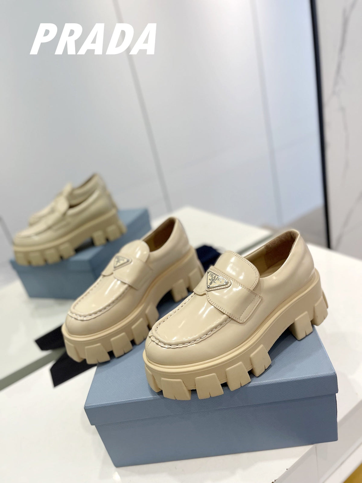 PRADA BRUSHED LEATHER MONOLITH LOAFERS BEIGE