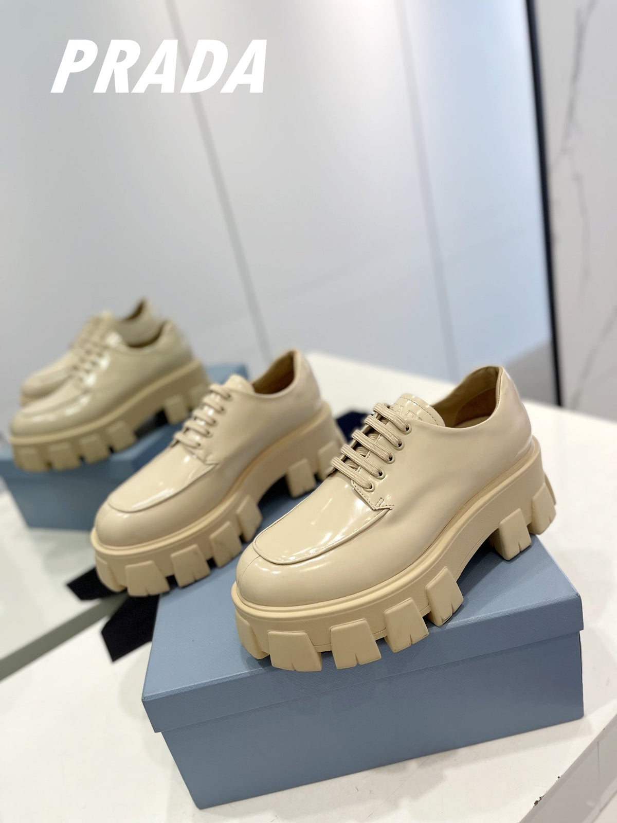 PRADA BRUSHED LEATHER MONOLITH LACE-UP LOAFERS BEIGE
