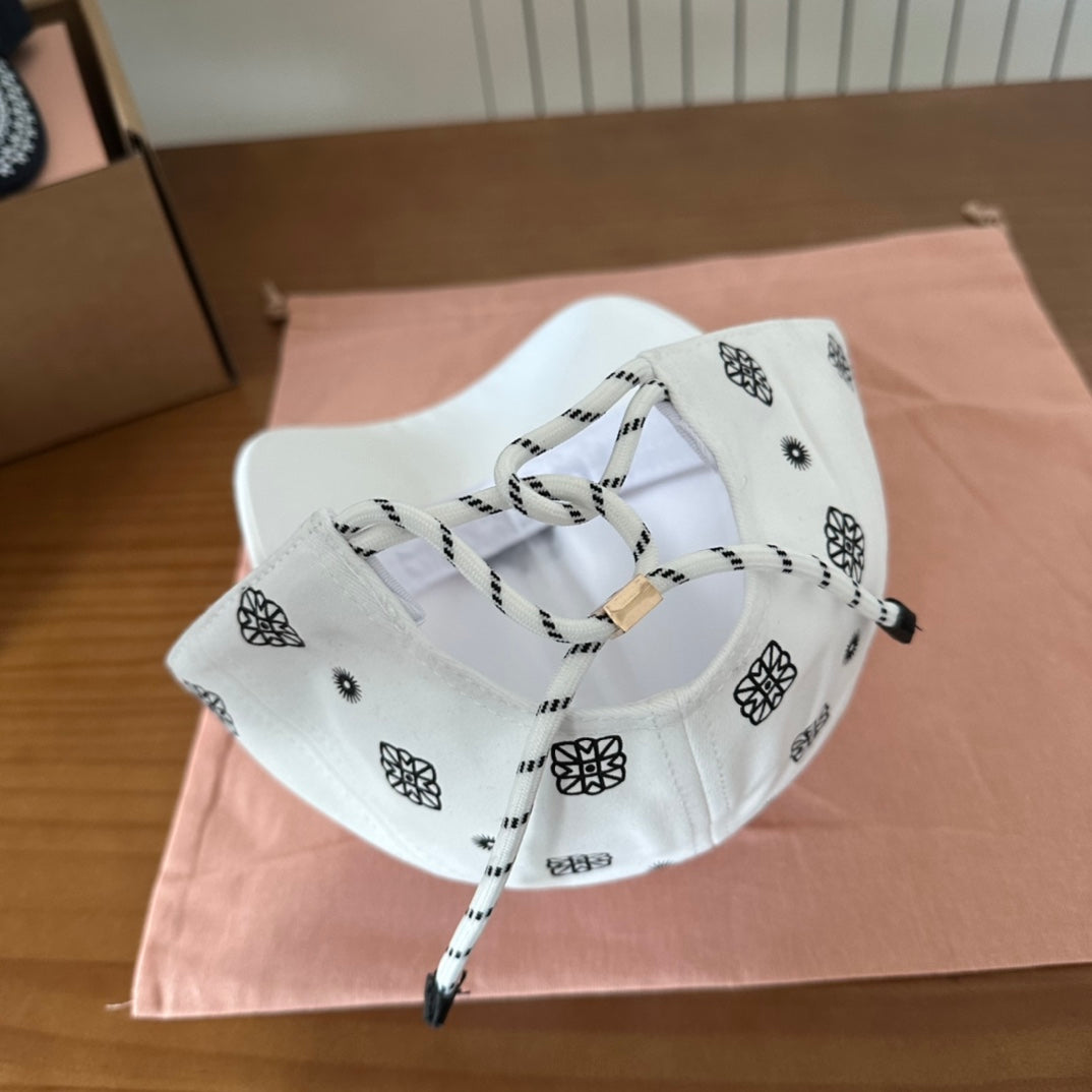 MM BASEBALL CAP IN WHITE WITH BLACK EMBROIDERED PATTERN