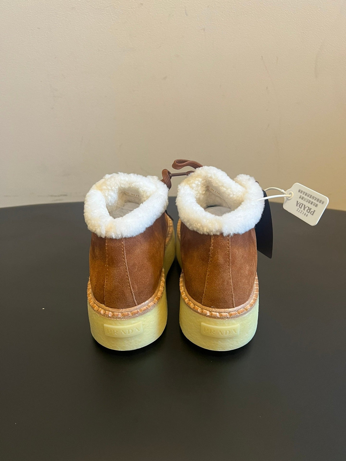 PRADA 25S HIGH-TOP SHOES 40 MM IN BROWN SUEDE SHEARLING-LINED