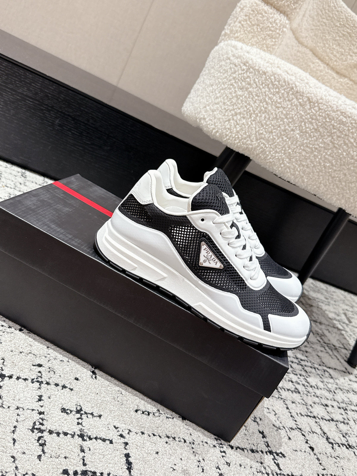 PRADA 25S MEN SNEAKERS IN BLACK AND WHITE CANVAS