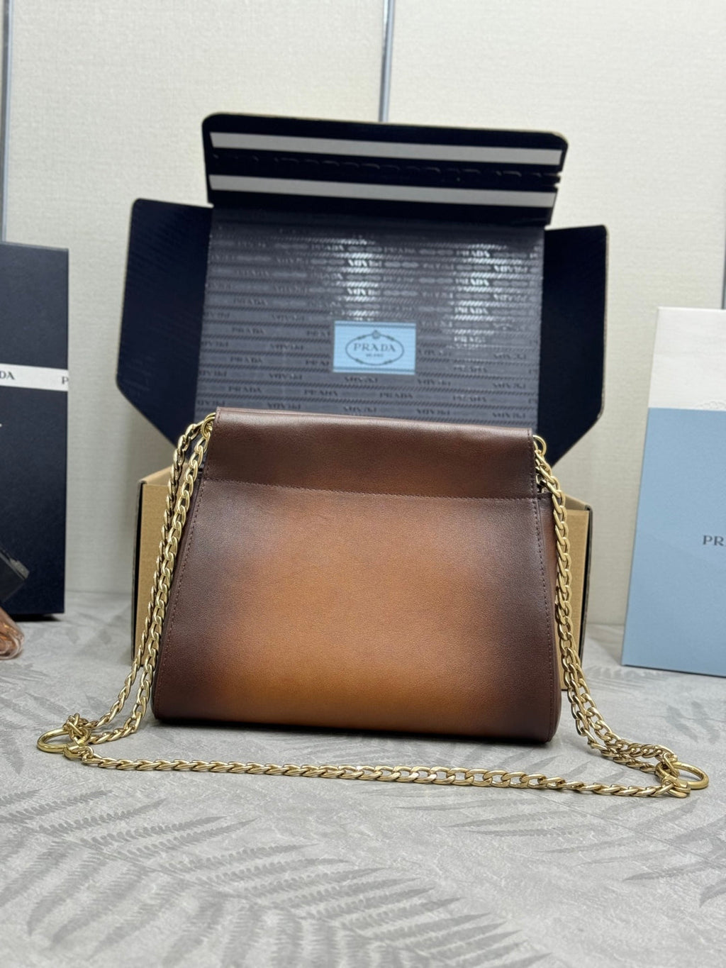PRADA 25S ENCHAINE MINI BAG 22 IN COGNAC CALFSKIN GOLD HARDWARE