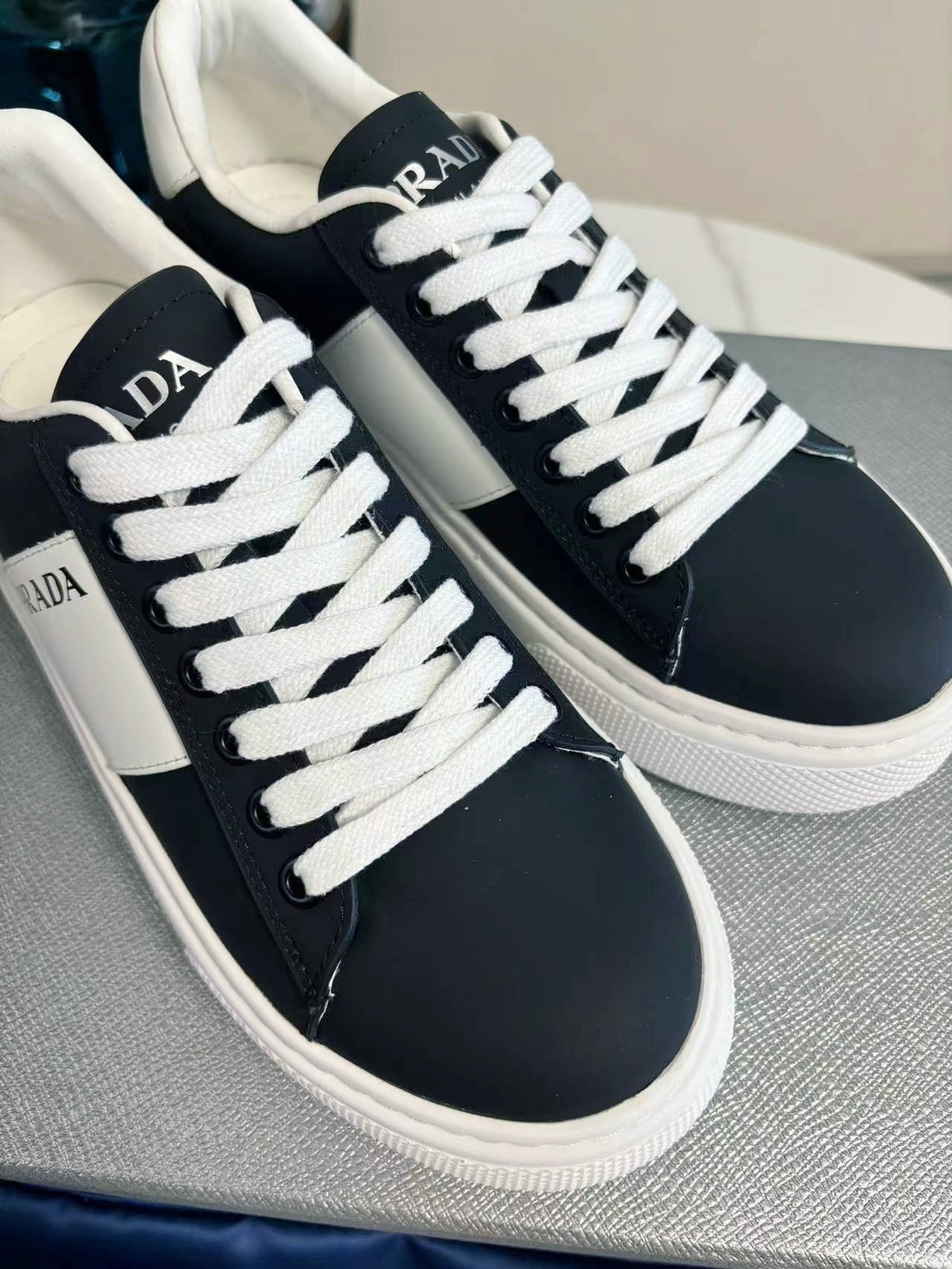 PRADA 25S LEATHER LOGO OUTLET SNEAKERS BLUISH BLACK CALFSKIN