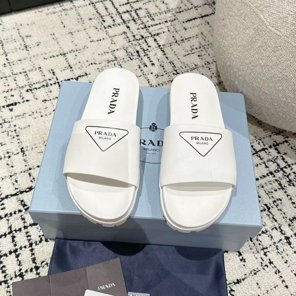 PRADA 25S RUBBER SLIDE IN WHITE CALFSKIN WITH LOGO