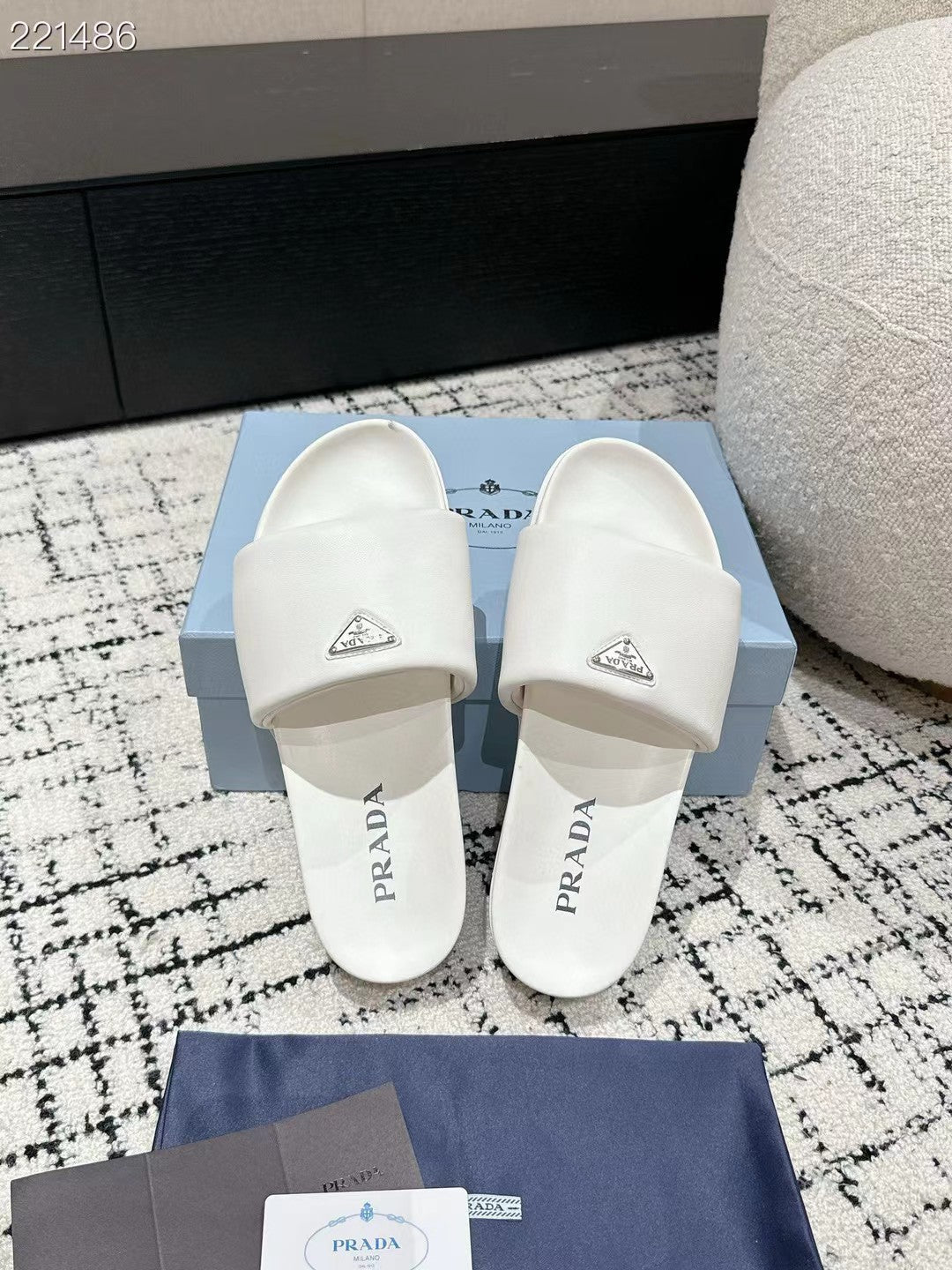 PRADA 25S PADDED SLIDES IN WHITE CALFSKIN WITH LOGO