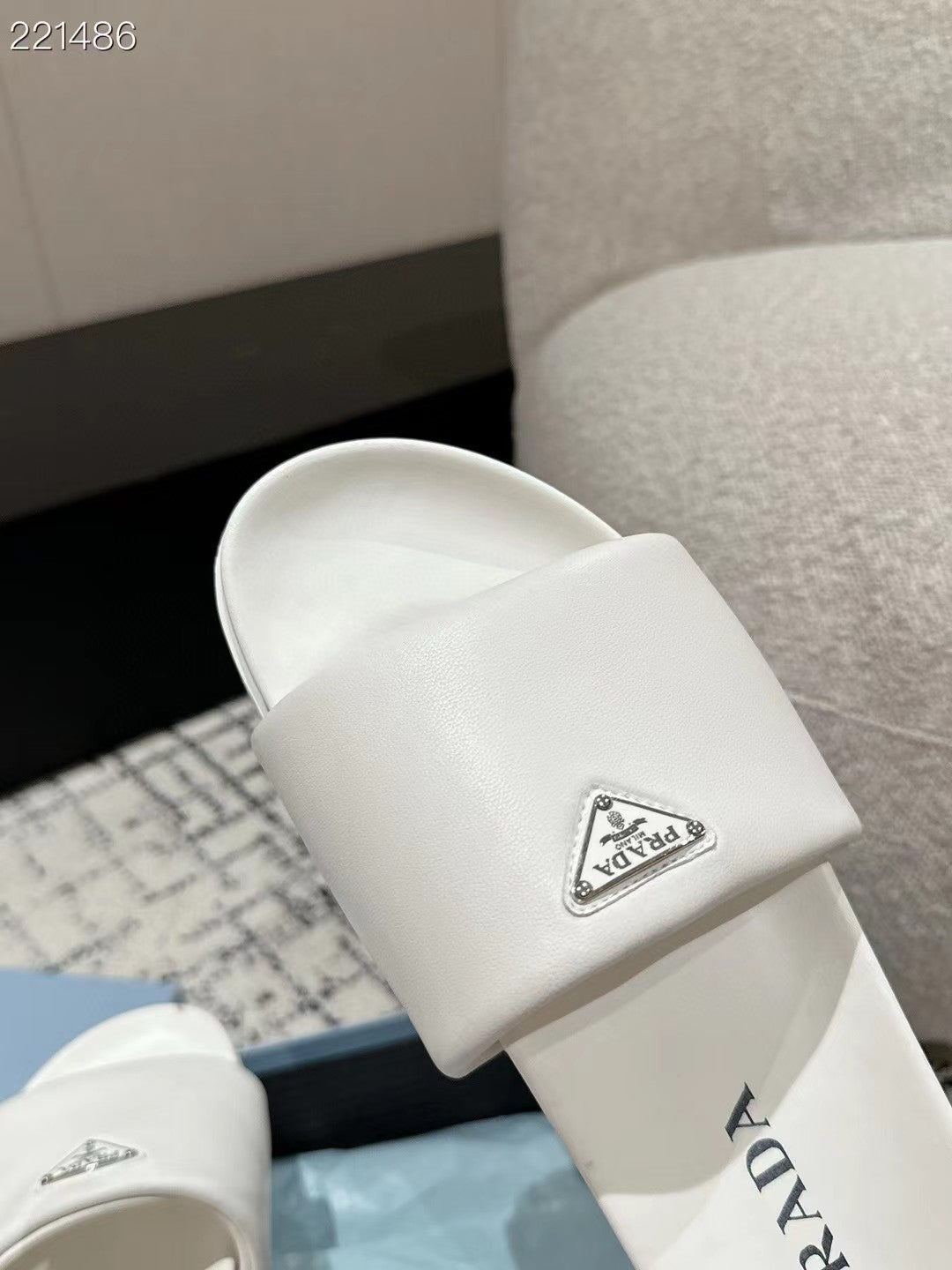 PRADA 25S PADDED SLIDES IN WHITE CALFSKIN WITH LOGO