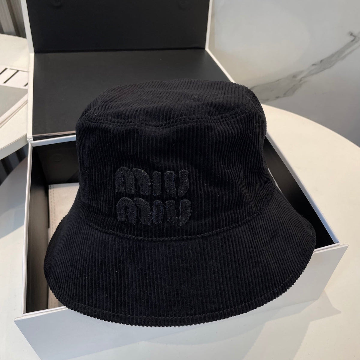 MM BUCKET IN BLACK VELVET WITH LOGO