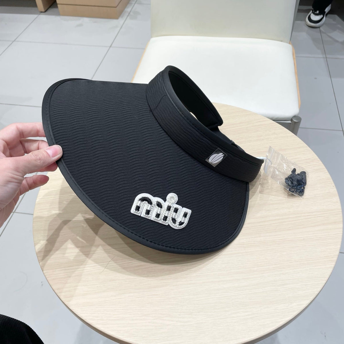 MM FASHION VISOR CAP IN BLACK AND WHITE WITH LOGO TEXT EMBROIDERY