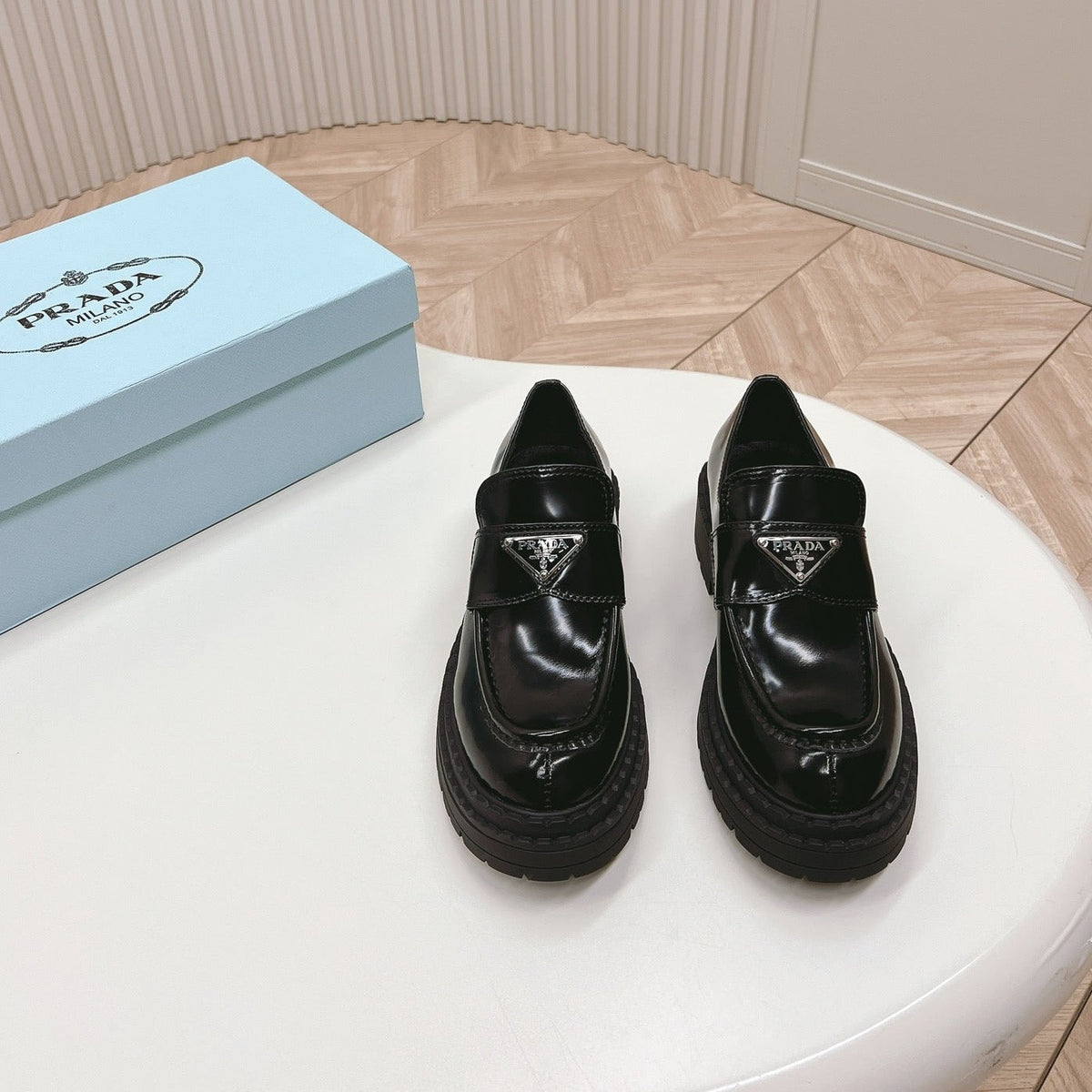 PRADA BRUSHED MONOLITH LOAFERS GLOSSY BLACK CALFSKIN