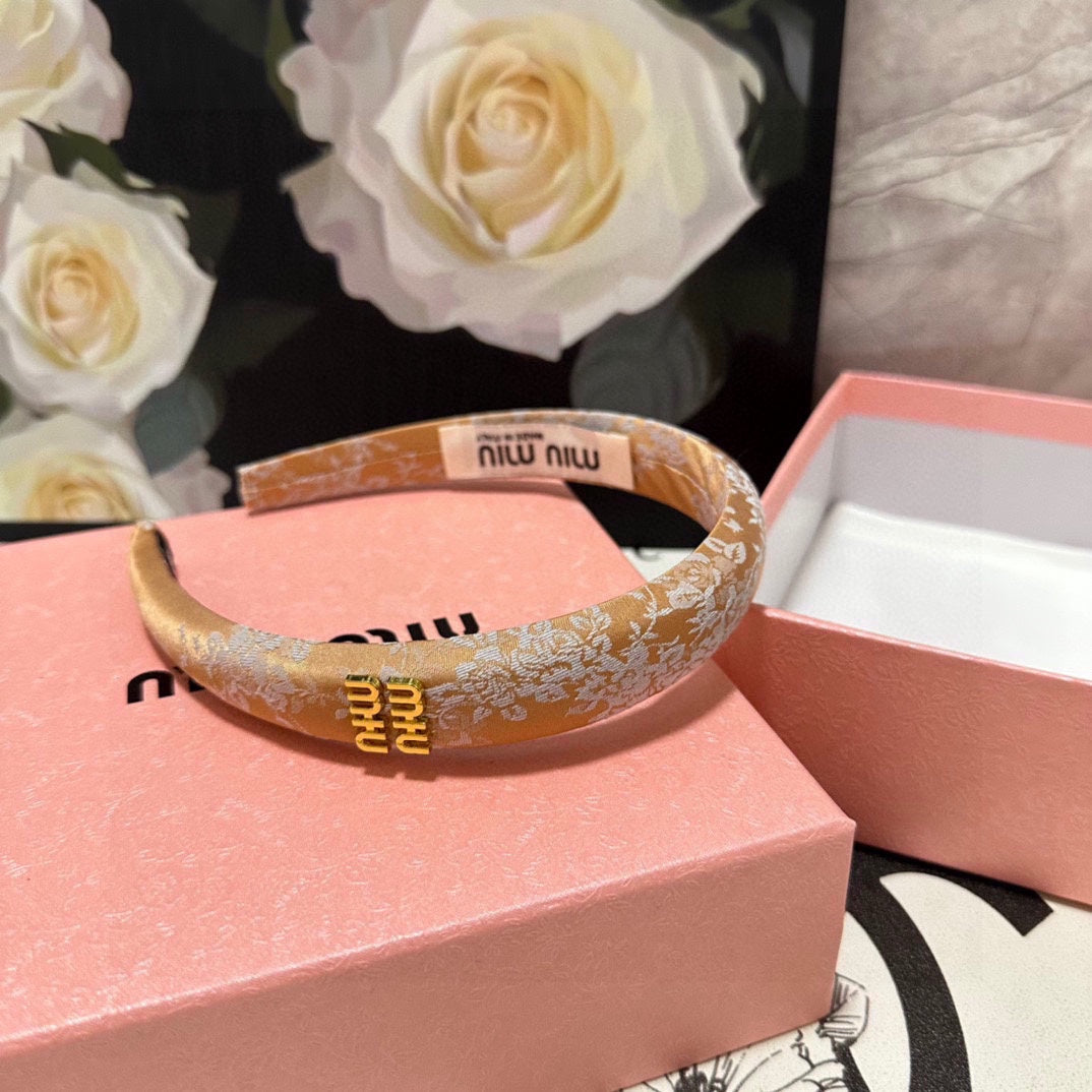 HEADBAND WITH GARNITURE PRINT IN TIGER EYE ORANGE SILK 432822
