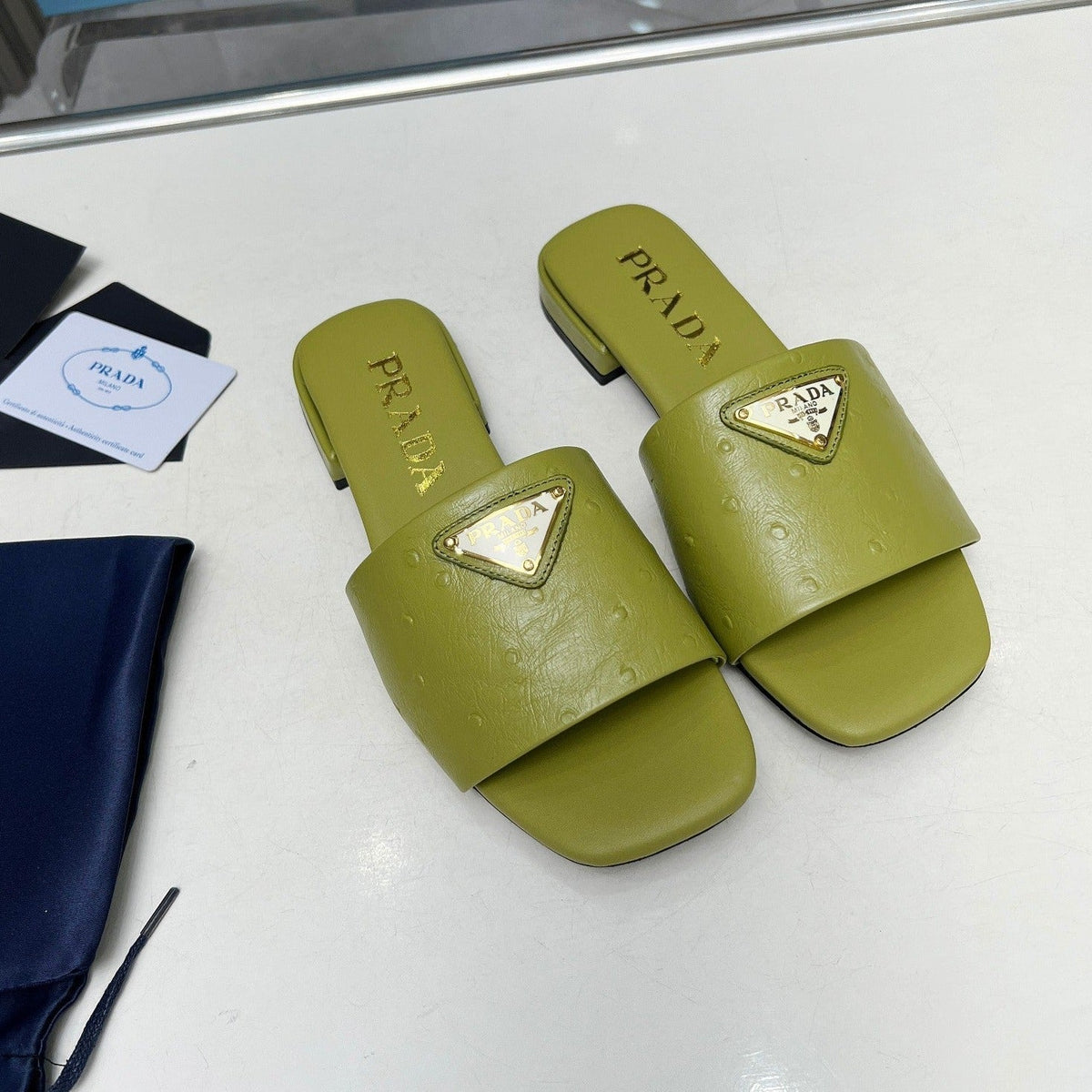 PRADA SAFFIANO PATENT SLIDES OSTRICH MOTIF PEAR CALFSKIN