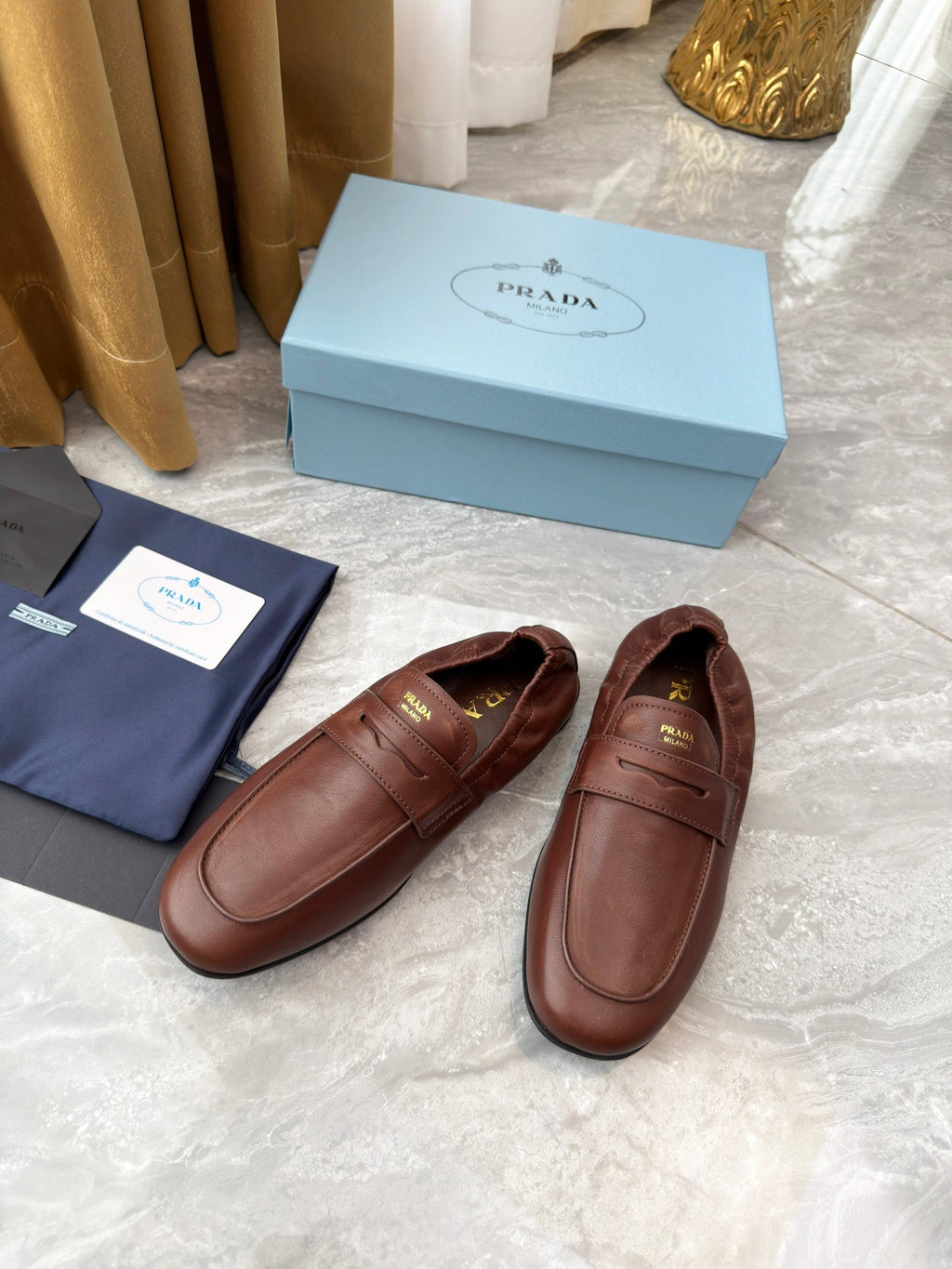 PRADA 25S LOAFERS IN BROWN CALFSKIN