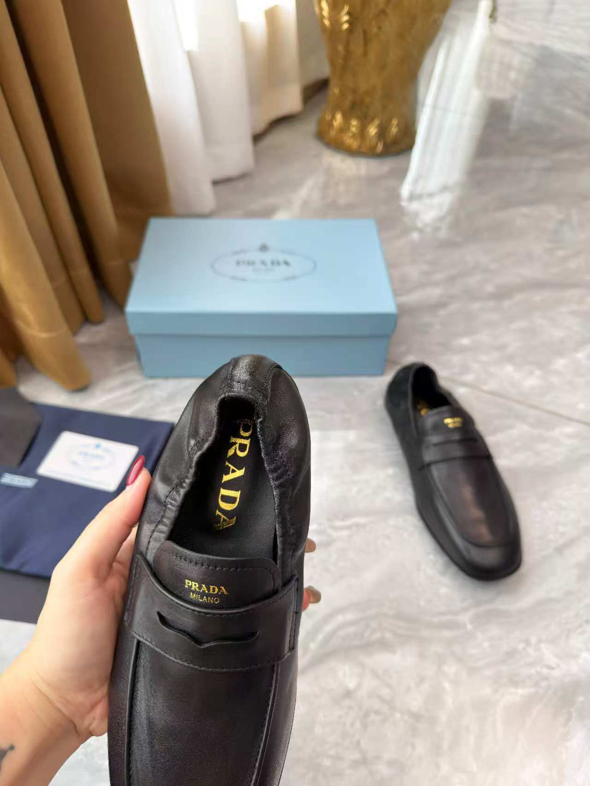 PRADA 25S LOAFERS IN BLACK CALFSKIN
