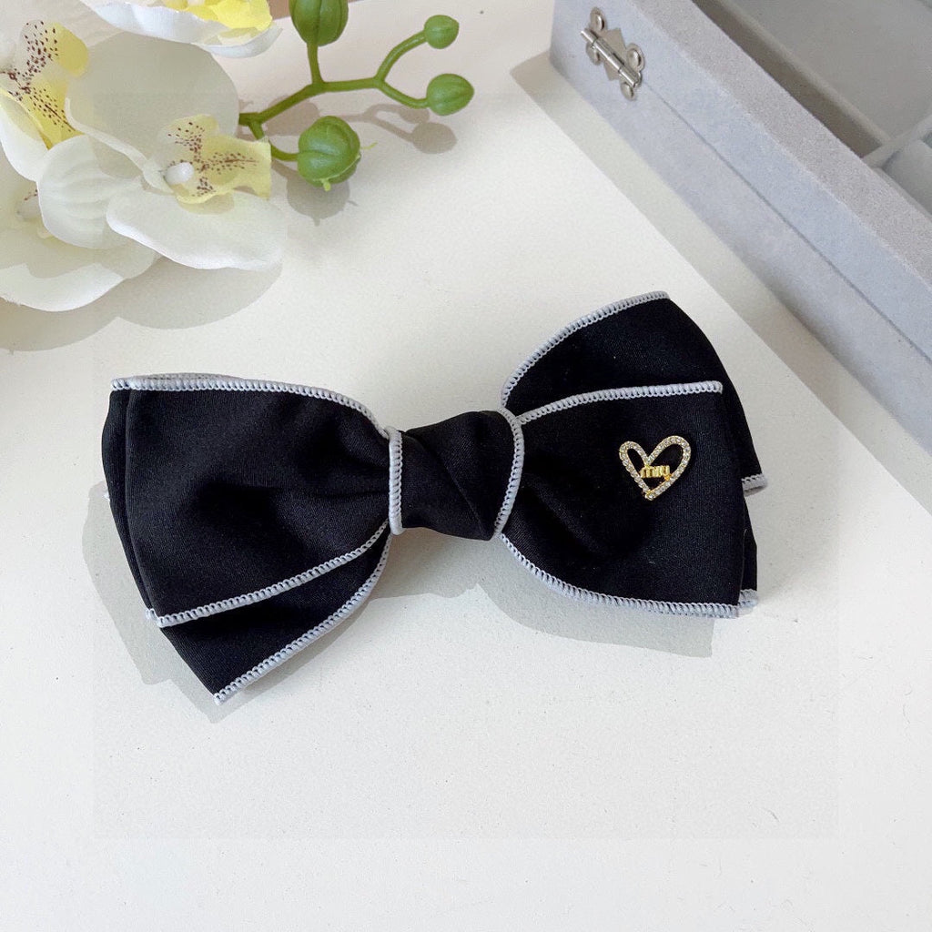 BOW HAIRPIN IN BLACK AND WHITE TRIM COTTON 406022