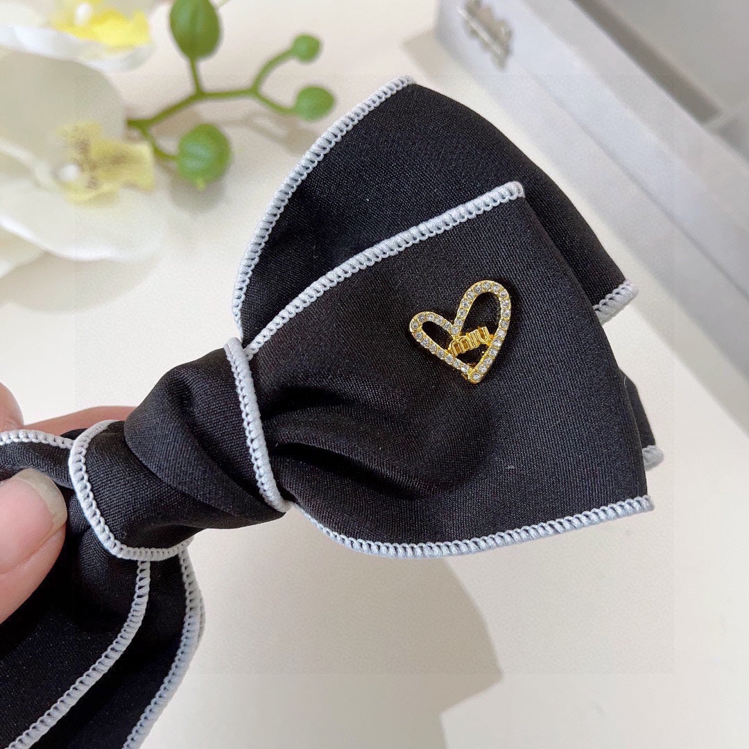 BOW HAIRPIN IN BLACK AND WHITE TRIM COTTON 406022