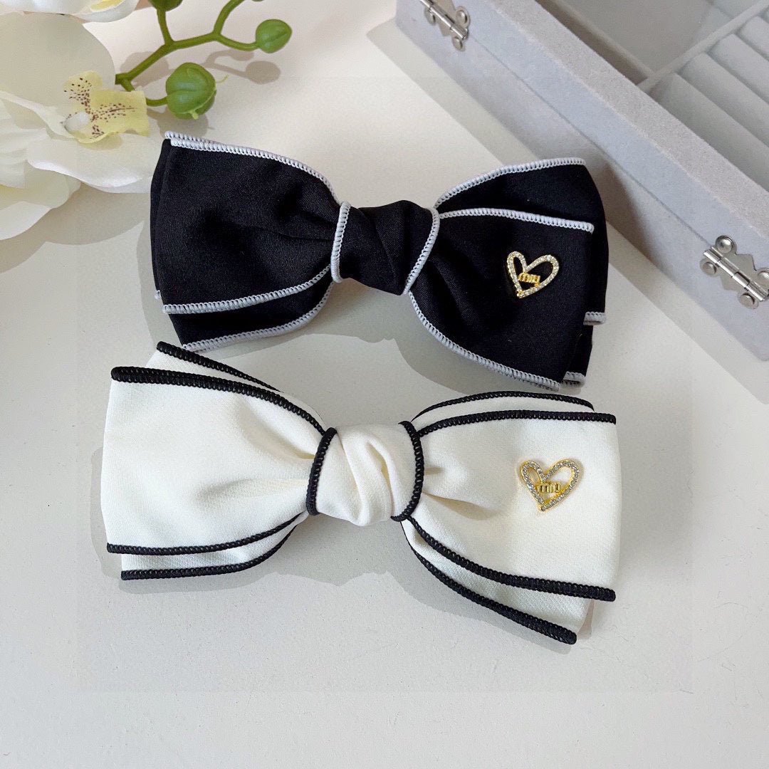 BOW HAIRPIN IN BLACK AND WHITE TRIM COTTON 406022