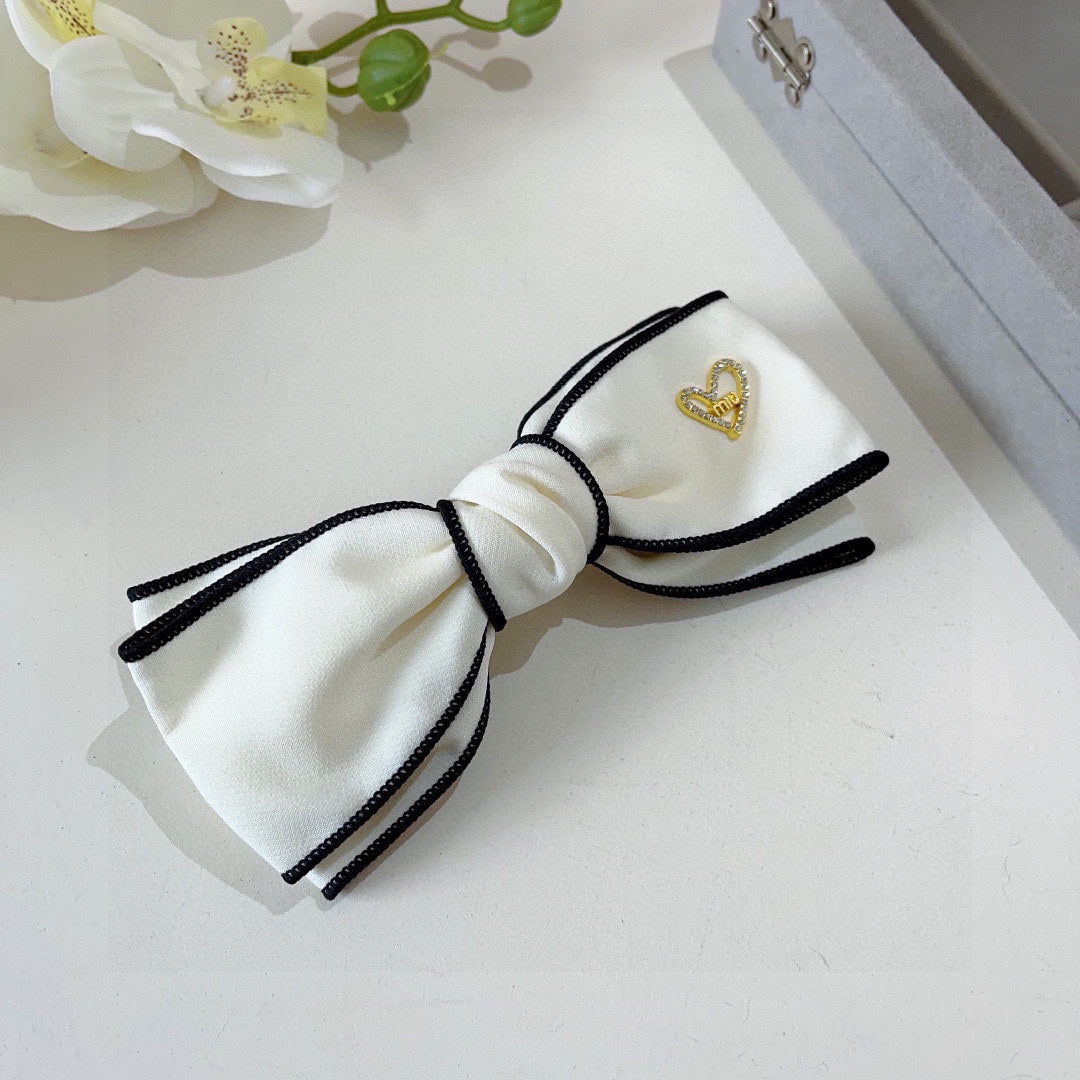 BOW HAIRPIN IN WHITE AND BLACK TRIM COTTON 406023
