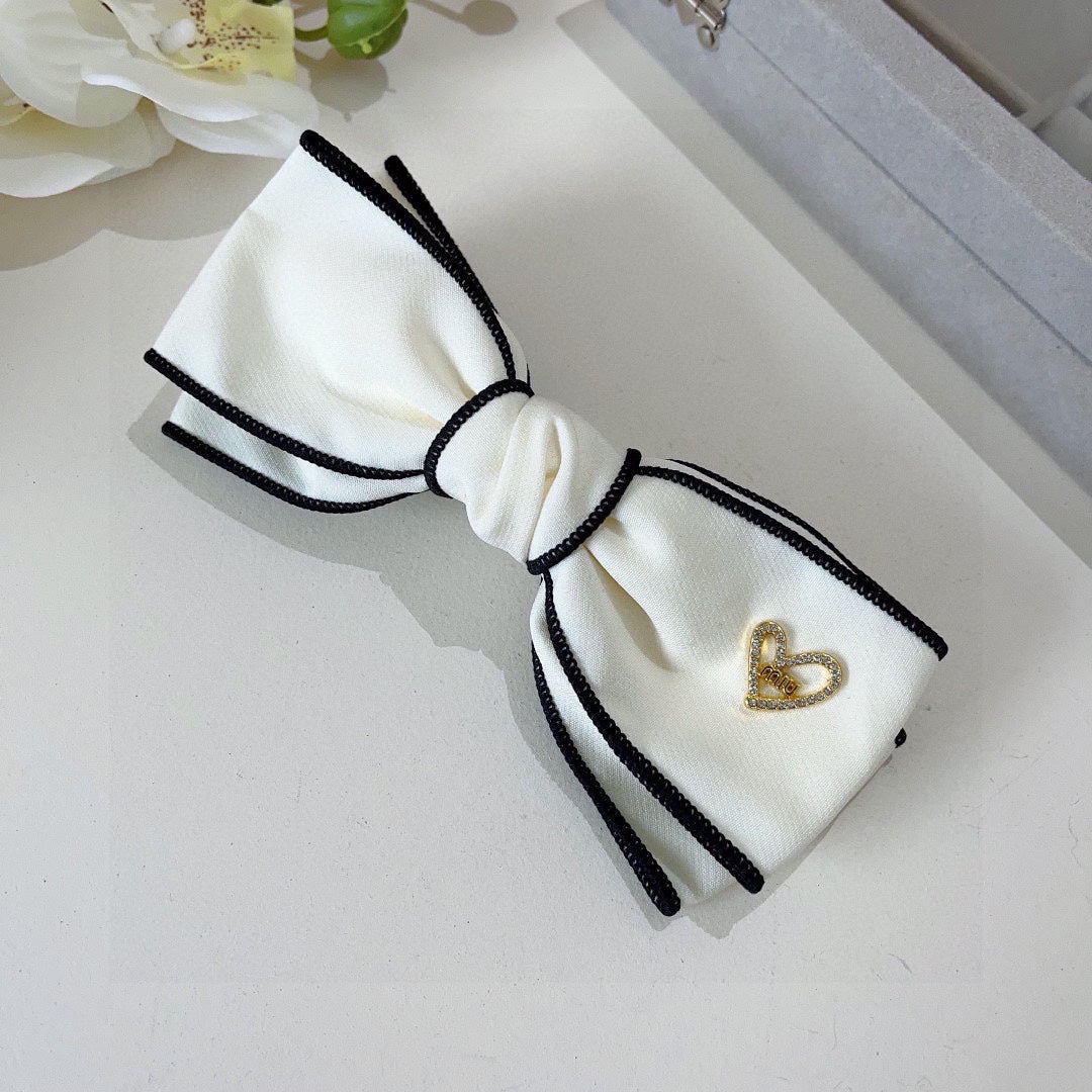 BOW HAIRPIN IN WHITE AND BLACK TRIM COTTON 406023
