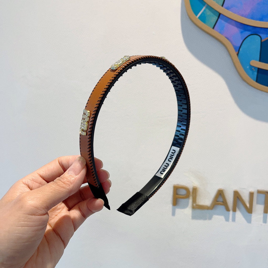 HEAD BAND IN BURNT ORANGE LAMBSKIN AND RESIN 417296