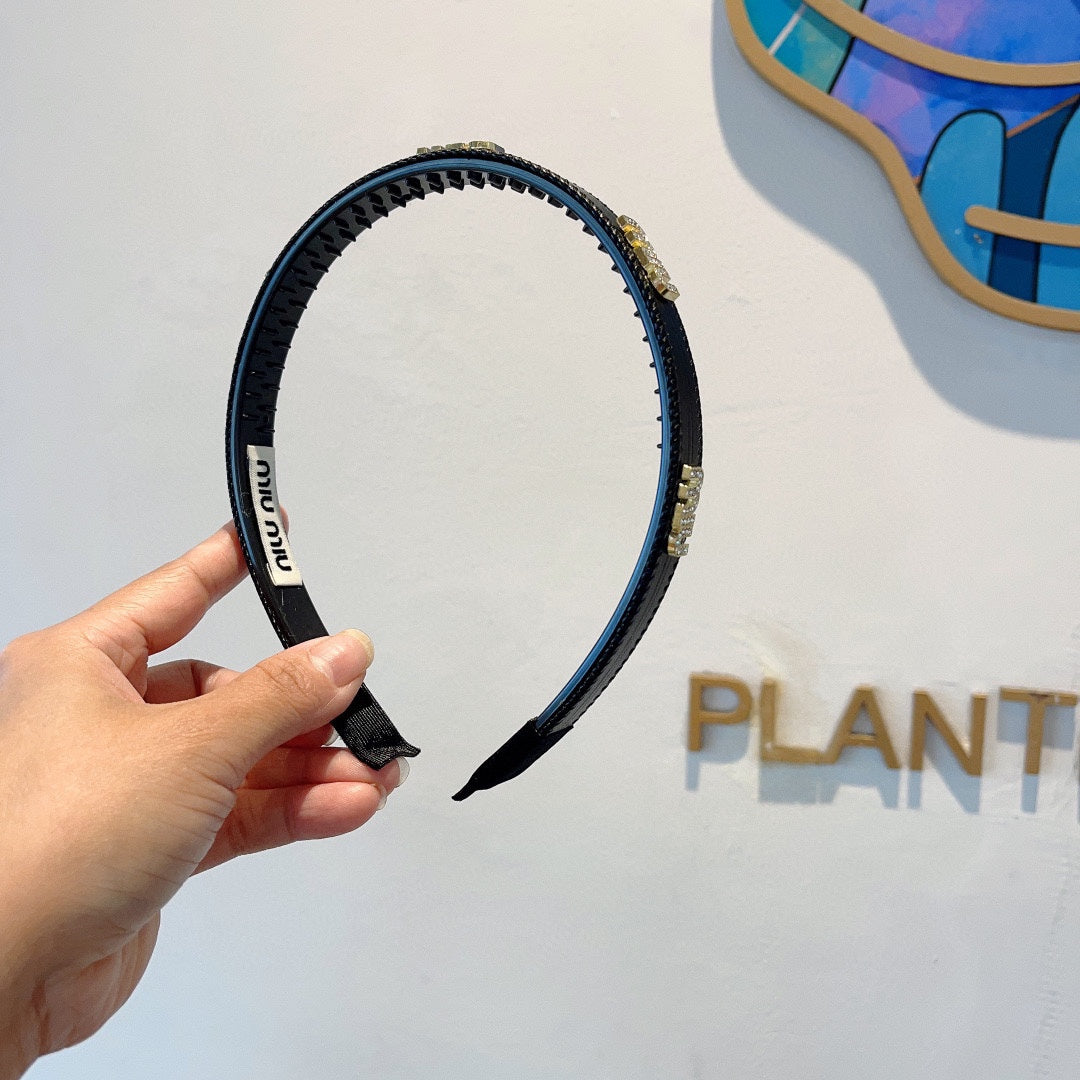 HEAD BAND IN BLACK LAMBSKIN AND RESIN 417299