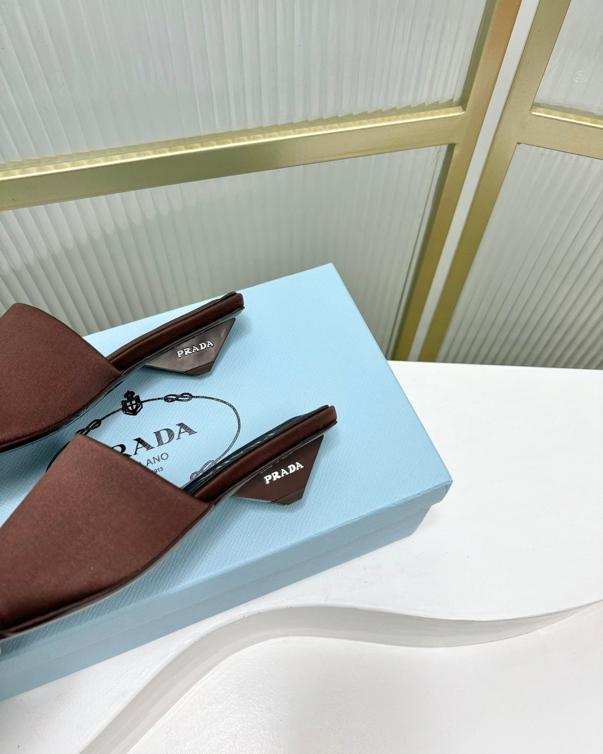 PRADA TRIANGLE HEEL SATIN SLIPPERS BROWN