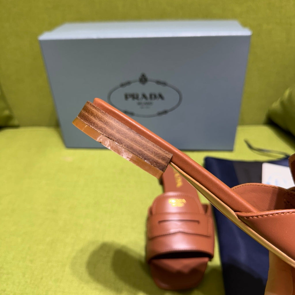 PRADA 25S SLIDES IN BROWN CALFSKIN