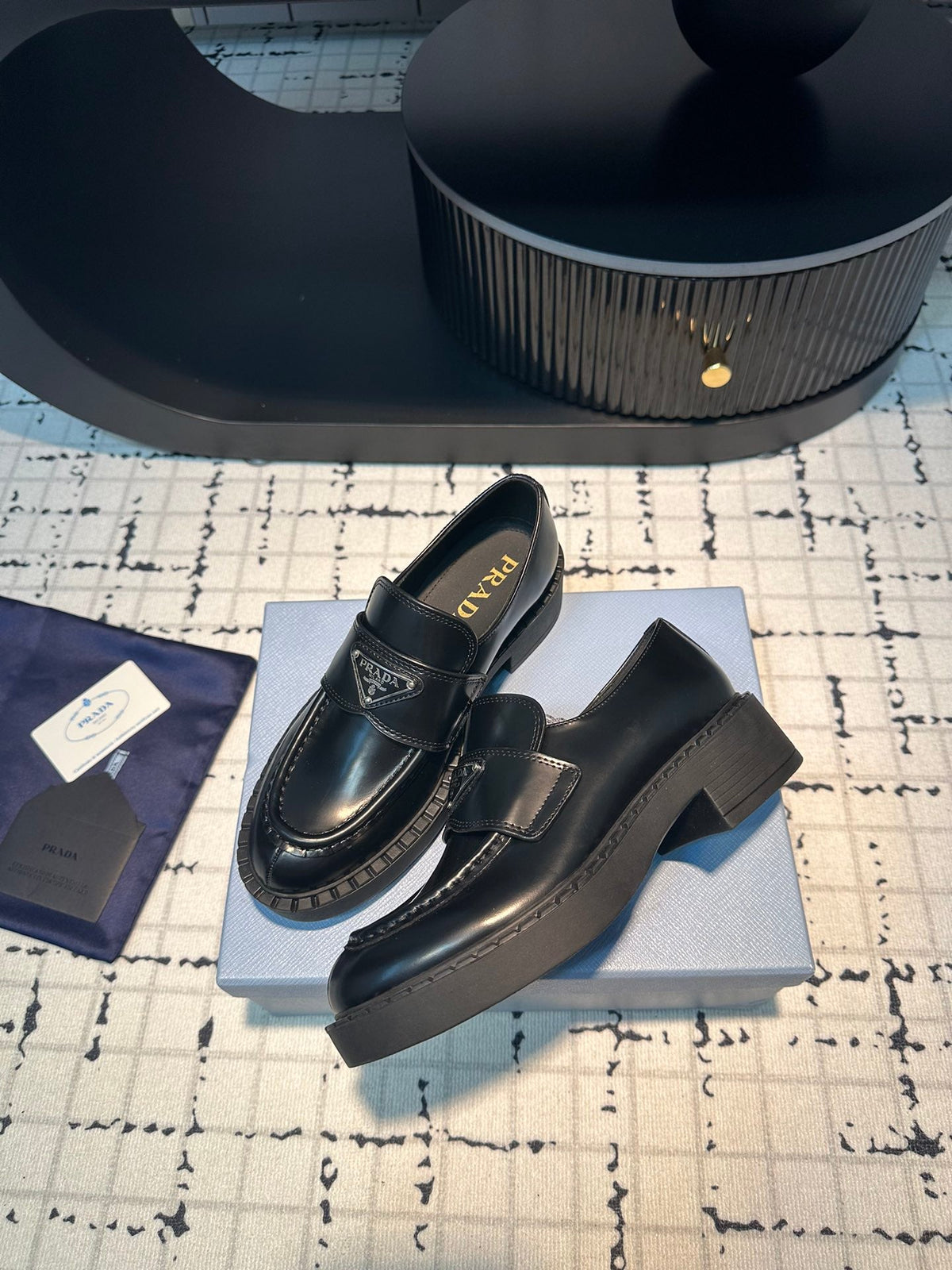 PRADA SCHOCOLATE BRUSHED LOAFERS BLACK CALFSKIN