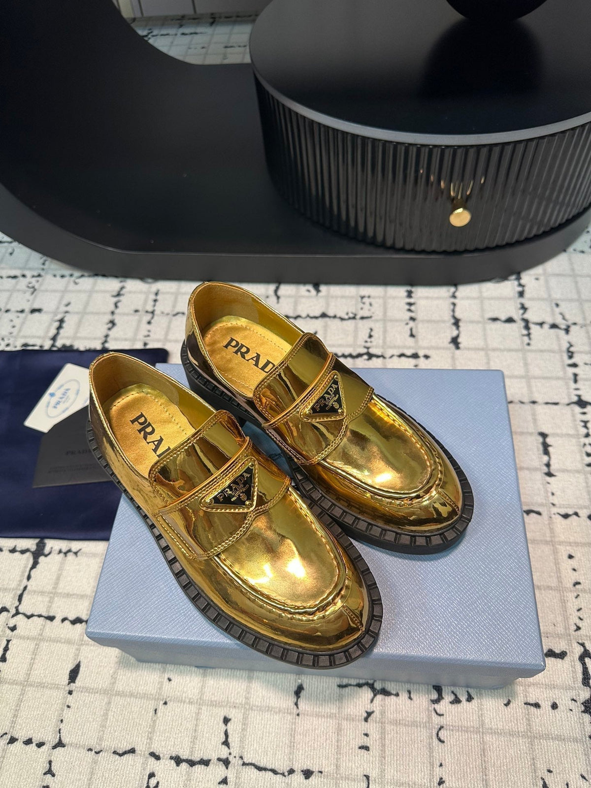 PRADA SCHOCOLATE BRUSHED LOAFERS METALLIC GOLD CALFSKIN