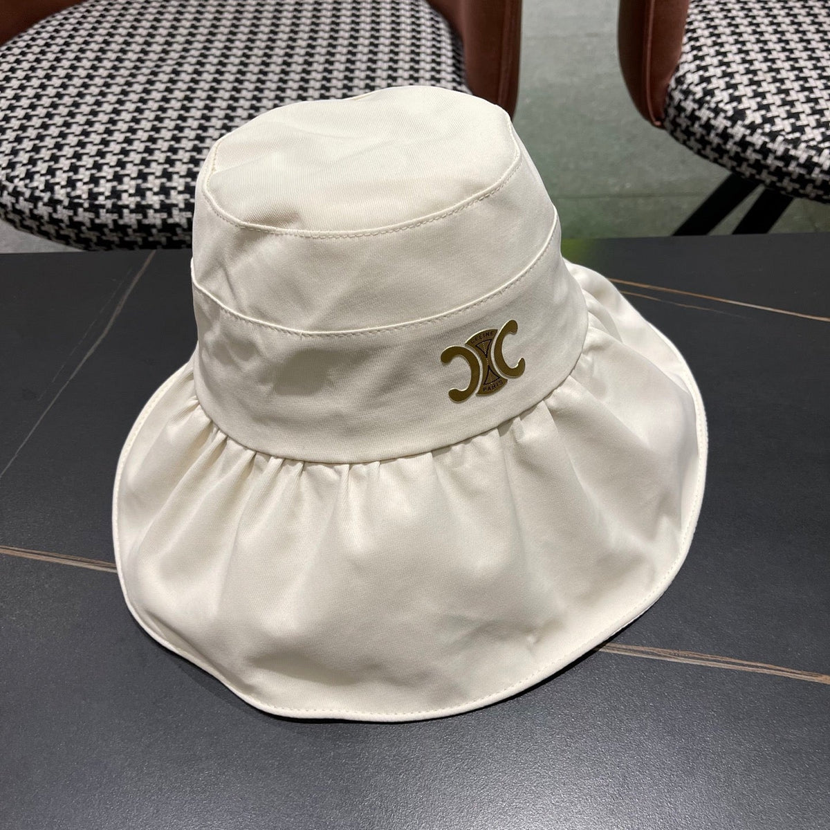 CELINE 25S BUCKET HAT 734983 IN WHITE