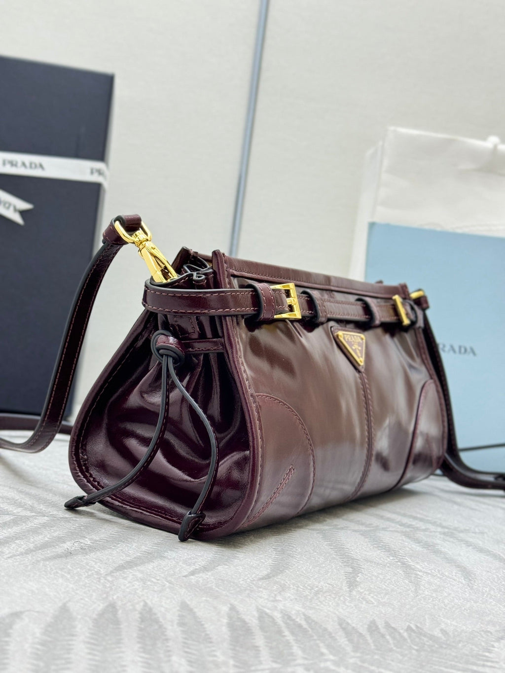 PRADA 25S BONNIE SMALL SHOULDER BAG 26 IN BURGUNDY GLOSSY CALFSKIN GOLD HARDWRE