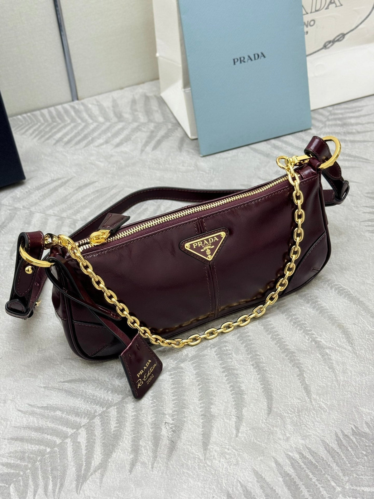 PRADA 25S RE-EDITION 2002 MEDIUM SHOULDER BAG 26 IN BURGUNDY CALFSKIN GOLD HARDWRE